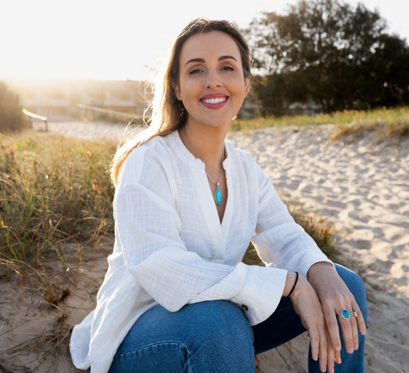 Meghan Brazh - Holistic Counsellor and Birth Chart Consultant on Gold Coast beach at sunset