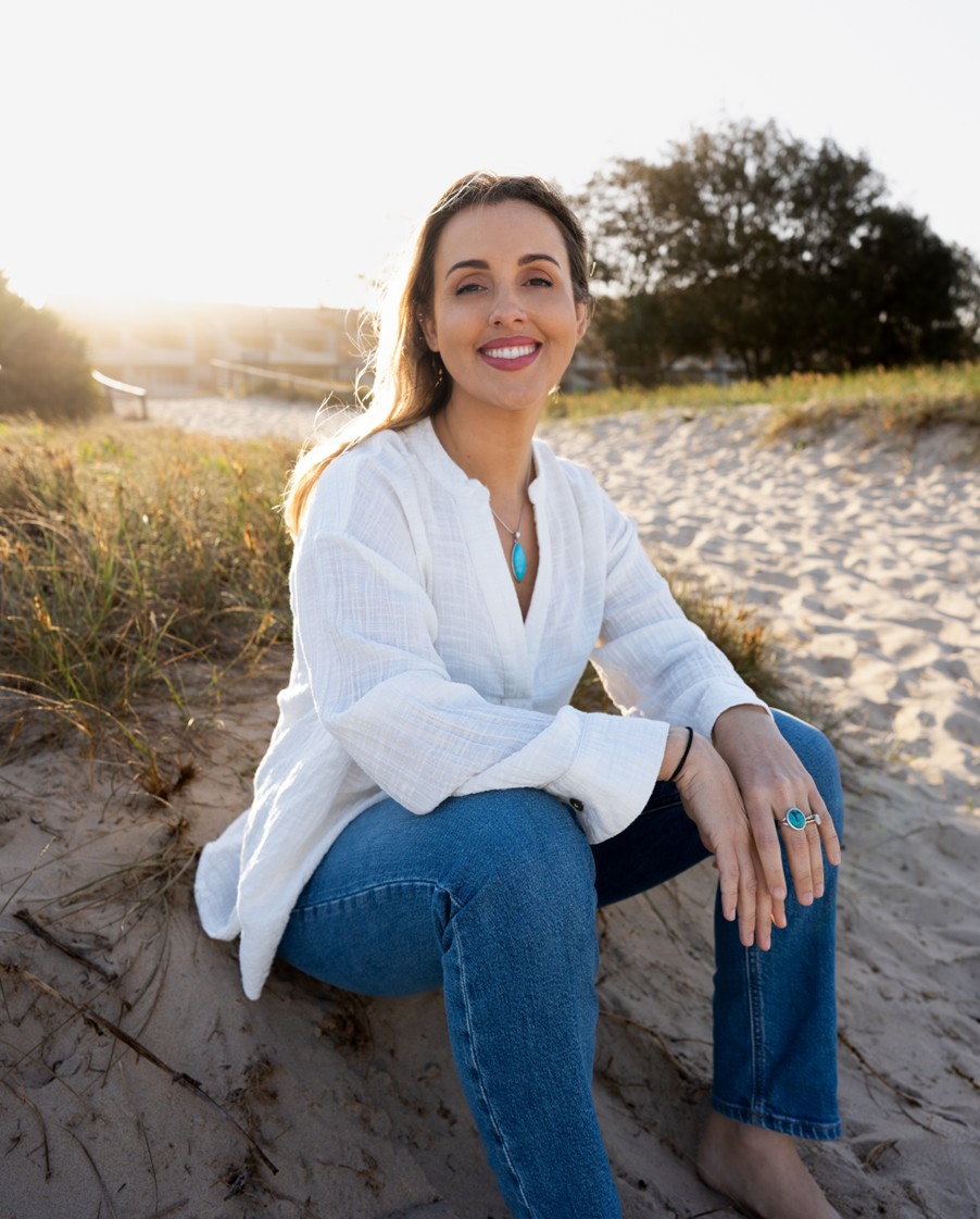 Meghan Brazh - Holistic Counsellor and Birth Chart Consultant on Gold Coast beach at sunset